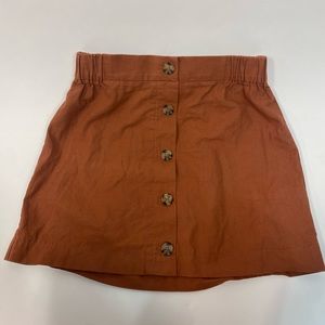 Good Luck Gem - burnt orange skirt with buttons
